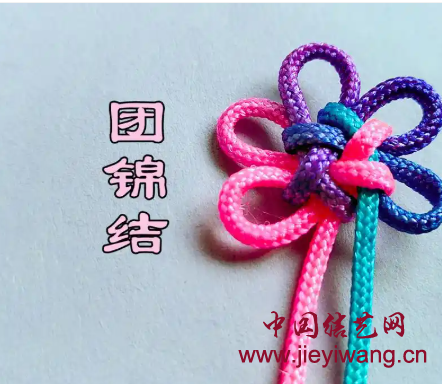 唐代金舞马衔杯纹银壶上的结饰 唐代金舞马衔杯纹银壶上的结饰